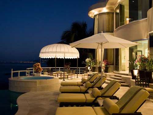 Villa Mi Paraiso: Casa Demae is under new ownership and has received a new name: Villa Paraiso.&nbsp; Those who have stayed at this super-deluxe oceanfront location before might wonder what improvements could possibly be made to make this villa even more enjoyable.&nbsp; They are invited to discover the changes in person.&nbsp; A pleasant surprise is that the villa now has 6 bedrooms and can sleep up to 12 guests comfortably with an option to even accommodate up to 14.&nbsp; All bedrooms have been upgraded with new mattresses, high thread count linens, flat screen&nbsp; SatelliteTV's, just to name a few of the exciting changes.&nbsp; All six bedrooms have in-suite Jacuzzis. The gourmet kitchen has been expanded to handle in-house Weddings and other Events for up to 75 people and cocktail parties for up to 125 guests can be catered by the staff. What remains the same is the unique oceanfront location offering an unparalleled vacation experience for a family celebration or entertaining business associates in style.&nbsp; Set amidst a lush Pacific seascape, this sophisticated home pampers you with fragrant tropical breezes and soothes your senses with the sound of the gentle surf lapping at the shore. Lounge in the expansive living room with cathedral ceilings or choose one of the two oceanfront terraces displaying Los Arcos islands a short boat ride way.&nbsp; In the distance, observe the town's beaches curving north towards Punta Mita at the tip of Banderas Bay. Romp in the crystalline waters of the heated infinity pool; follow the invitation of your caring staff to savor gourmet meals from the chef's kitchen; enjoy magical sunsets from the floor-length windows; and gaze at the multitude of stars by telescope.&nbsp; Create your own memories in this one-of-a-kind paraiso.&nbsp; UNIQUE FEATURES:&nbsp; 3-meal service 24-7 plus security personnel.&nbsp; Living room has 52 flat screen HD Satellite TV,&nbsp; DVD, CD. Stereo sound system throughout. iPod docking station. Each bedroom has 31 flat screen TV and key lock safe.&nbsp; Bath robes, blow dryer, toiletries provided. Concierge on site to arrange activities and birthday/other celebrations including: mariachi, fireworks pinata, DJ/Karaoke, Spa treatments, birthday cake, balloons and more.&nbsp; In-house event planner available to host wedding celebrations.